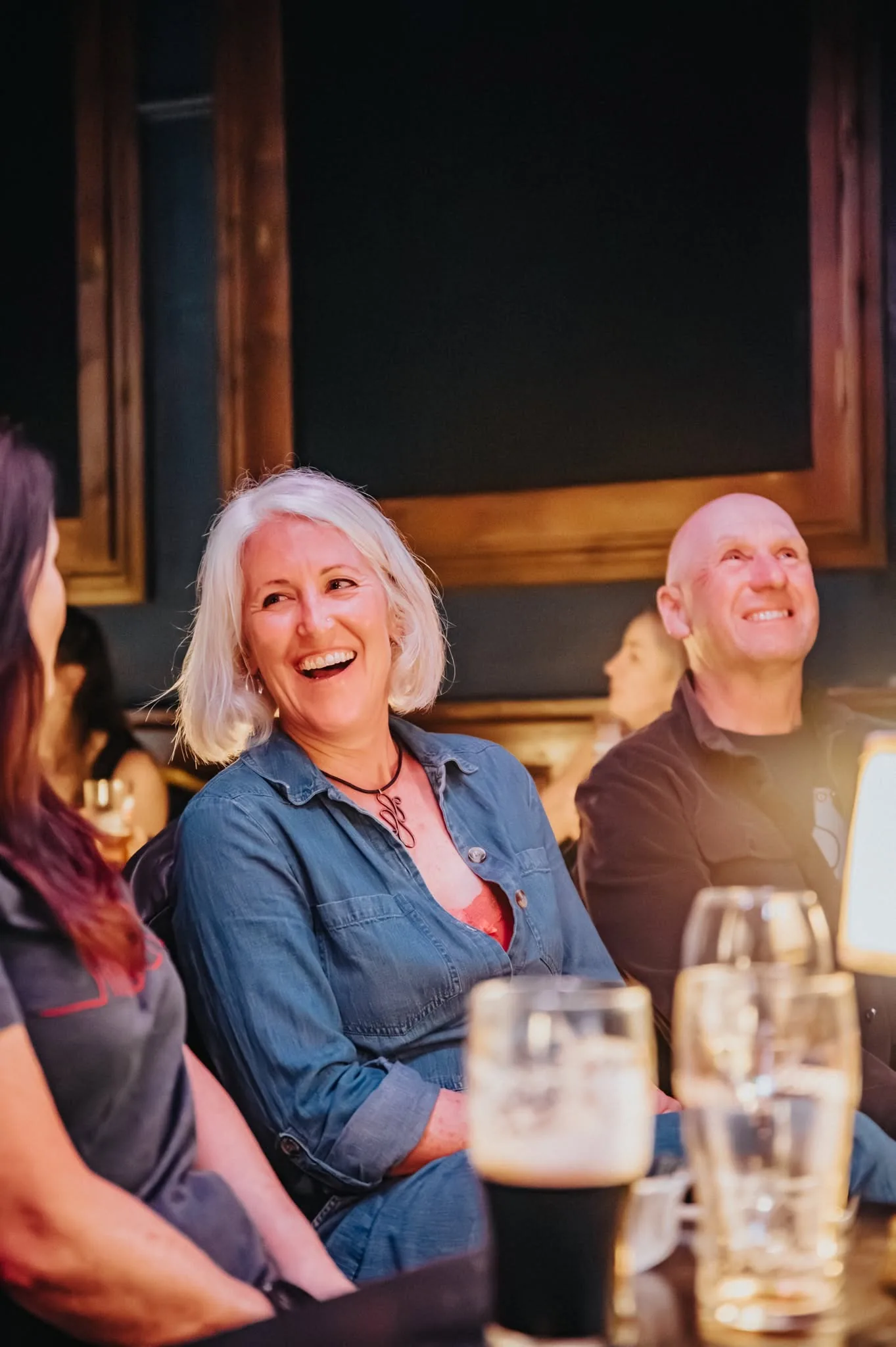 Audience member reacting during a comedy magic performance
